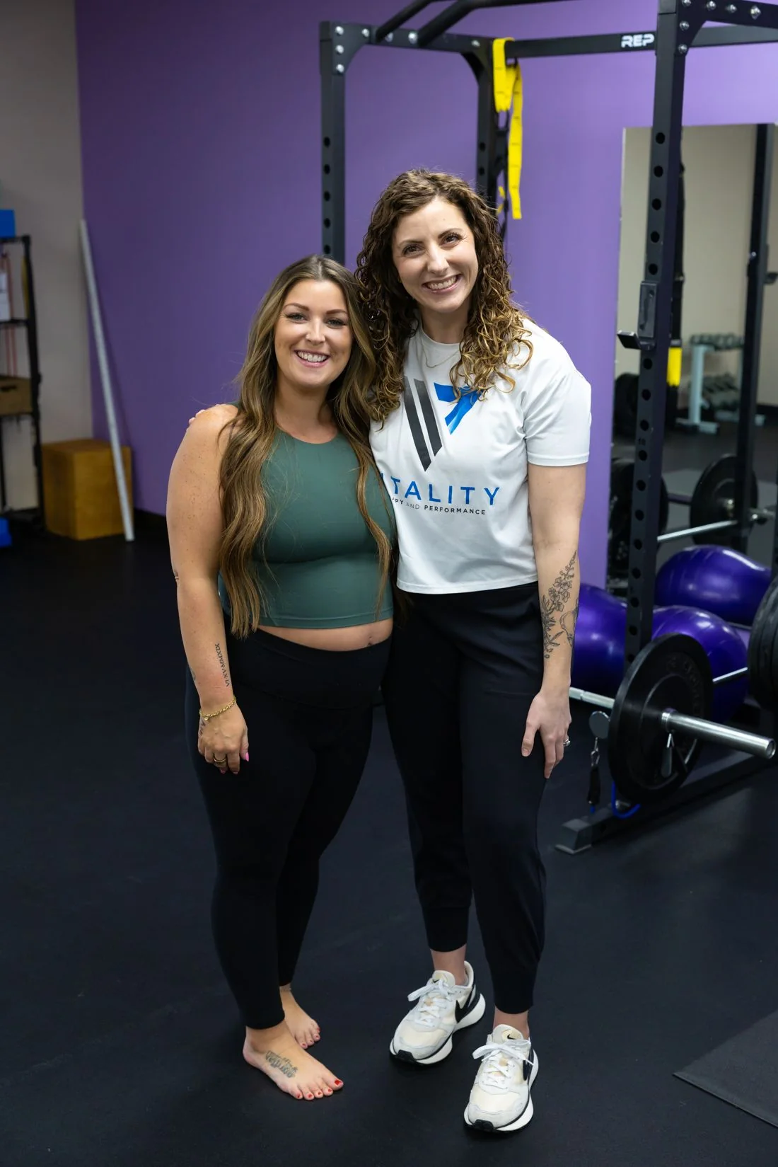 Vitality Pelvic Health therapist consulting with a postpartum patient