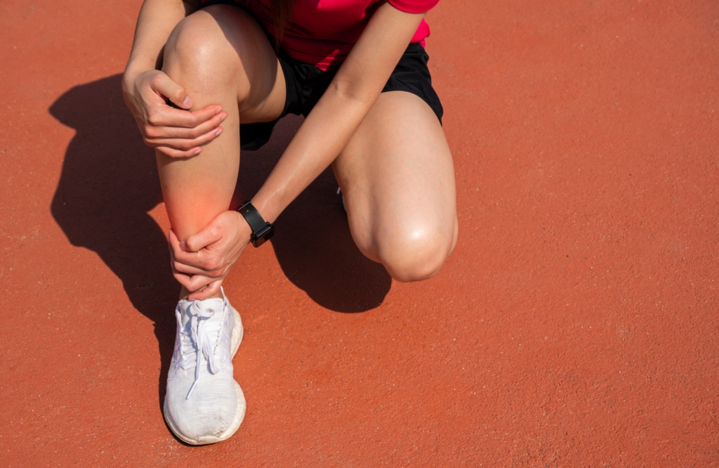runner holding shin