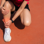 runner holding shin
